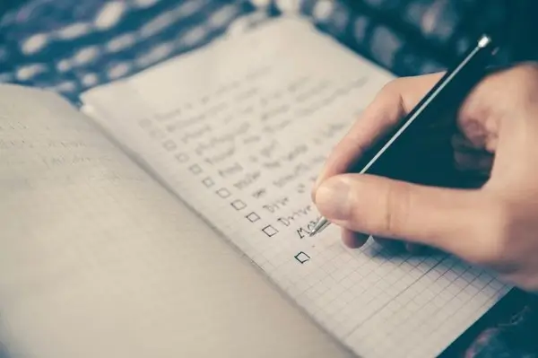 Writing with Pen on Paper